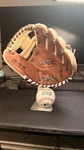 Youth-level Wilson Baseball Glove A450 10.75 Inch Right Hand Throw Tan. Fixed Price $60.00.