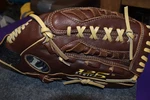 Baseball Glove Model 125S1300 New Series Professional Louis. Slugger. Fixed Price $37.00.