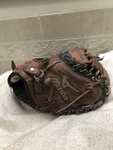 Mizuno GXC-104 31 Boys Fully Broken In Baseball Catchers Mitt Right Hand Throw. Fixed Price $85.00.