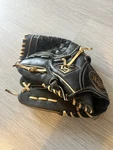 Louisville Slugger Dynasty Series Left Handed Baseball Glove Black Tan. Fixed Price $26.79.