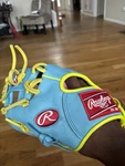 Rawlings Heart Of The Hide PRO200T2 9.5" Lht Glove Blue/pink/yellow. Fixed Price $135.00.