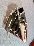 Rawlings Red, Black, White - Players Series PL10DSSW. Fixed Price $15.99.