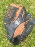 Easton Synergy Pro SP1200 Baseball/softball Glove 12" Rht Black & Brown. Fixed Price $23.99.
