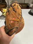 Rawlings Lite Toe RCM30C Used- Joe Mauer Needs Cleaning- Left Hand Glove. Fixed Price $40.00.