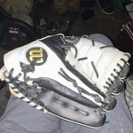 Wilson A500 Leather Padded Baseball Glove Left Hand Black/white/gold. Fixed Price $35.00.