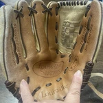 Louisville Slugger Youth Catchers Mitt Series 10.5 Full Grain Leather. Fixed Price $12.56.