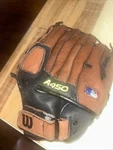 Wilson Youth A450 Baseball Glove 11" Pre Owned Right Hand Throw Genuine Leather. Fixed Price $17.00.