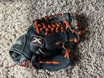 Worth Sports Toxic Extreme Black Orange Youth Baseball Glove 11.5" Rht TX1150. Fixed Price $24.99.