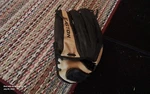 Easton Size 12.5 Brown And Black Good Condition Glove. Fixed Price $10.00.
