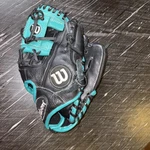 Wilson A500 Boys Tight Fit Black & Green 10.75 Baseball Glove Right Hand Throw. Fixed Price $55.00.
