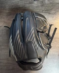Rawlings Nxt Series 205-9X 11.75 Black Baseball Glove. Fixed Price $150.00.