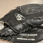 Louisville Slugger Rocket Man 11.5" Rht Black RM14-BK. Fixed Price $32.75.