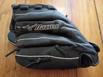 Mizuno Finch GPP-1203D4 12" Right Hand Throw Black Leather Glove. Fixed Price $15.00.