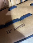 Wilson Baseball Glove A2488 12 Black & Brown Leather Right Hand Throw Sm Flaw. Fixed Price $12.99.