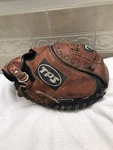 Louisville F205 Broken In, Thick & Well Padded 33 Softball Catchers Mitt Right. Fixed Price $100.00.