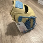 Rawlings Heart Of Hide 11.5 Infield Baseball Glove Yellow Blue Leather. Fixed Price $300.00.
