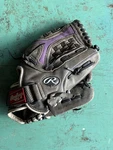 Rawlings Storm ST1250FP Softball Glove 12.5 Inch Right Hand Throw Black/purple. Fixed Price $17.99.