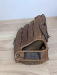 Primo Sporting Goods Inc. 37105 Rawhide Lace Baseball Mitt Left Hand. Fixed Price $18.00.