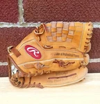 Rawlings Right-hand Thrower 12" Baseball Glove Model (RBG65B). Fixed Price $18.00.